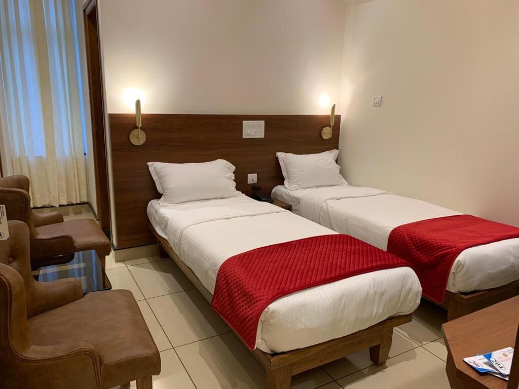 Jesta Residency Hotel Hassan Exterior foto